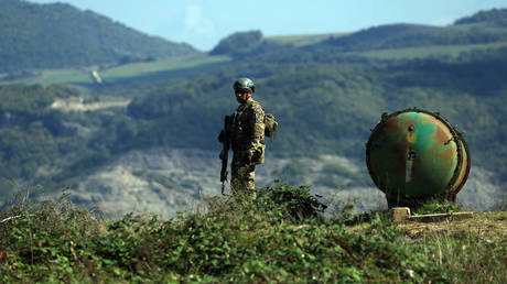 An Azerbaijani soldier mans a former ethnic Armenian militia post in Mukhtar, Nagorno-Karabakh, October 3, 2023.