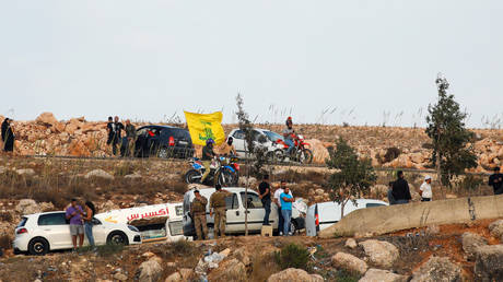 FILE PHOTO: Lebanese protesters and soldiers gathering on the Israeli border after Hamas group launched a surprise attack on Israel from the Gaza Strip on Saturday.