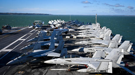 F-18 jet fighters on the flight deck of USS Gerald R. Ford, on November 17, 2022 in Gosport, England.