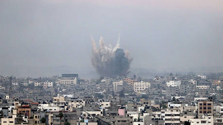 Smoke rises after Israeli airstrike in Gaza Strip