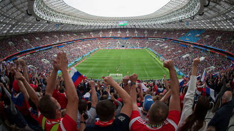 General view of the stadium as fans celebrate the opening goal scored by Iury Gazinsky of Russia during the 2018 FIFA World Cup Russia Group A match between Russia and Saudi Arabia at Luzhniki Stadium on June 14, 2018 in Moscow, Russia