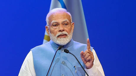 India's Prime Minister Narendra Modi addresses the gathering during the inauguration of 141st Session of the International Olympic Committee (IOC), in Mumbai on October 14, 2023