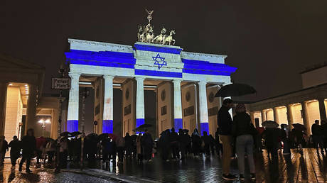 The Brandenburg Gate illuminated in the colors of the Israeli flag as a show of solidarity, Berlin, October 7, 2023.