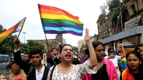 FILE PHOTO: Members and supporters of LGBTQ community holld rainbow flag while taking part in the annual LGBTQ Pride Parade, Kolkata, India.