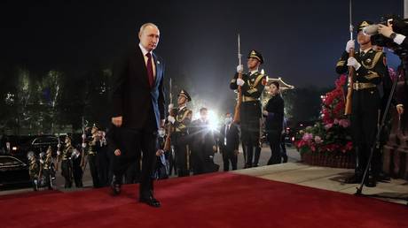 Russian President Vladimir Putin arrives for a welcoming ceremony for heads of delegations participating in the 3rd Belt and Road Forum for International Cooperation, at the Great Hall of the People in Beijing, China.