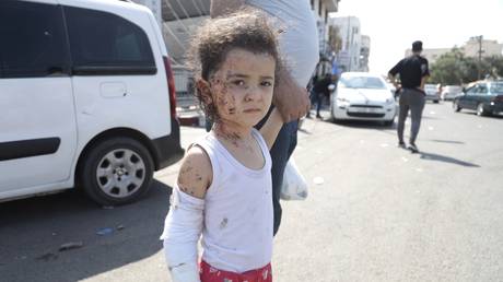 A child injured in an Israeli missile strike on Gaza Strip, October 12, 2023