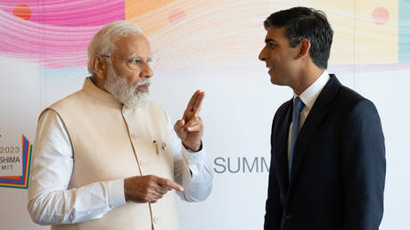 British Prime Minister Rishi Sunak (right) meets with Prime Minister of India Narendra Modi on the final day of the G7 Summit on May 21, 2023 in Hiroshima, Japan.