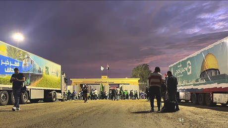 A humanitarian aid convoy for the Gaza Strip is parked at the Rafah border crossing in Egypt, October 17, 2023.