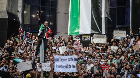 Egyptian demonstrators shout slogans during a demonstration against Israel on October 18, in Cairo, Egypt.