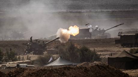 FILE PHOTO: Israeli artillery in action on October 12, 2023