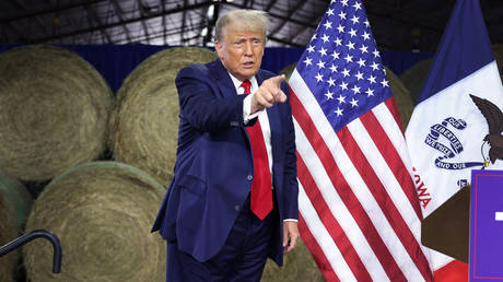 Republican presidential candidate former President Donald Trump finishes a campaign event on October 16, 2023 in Adel, Iowa.
