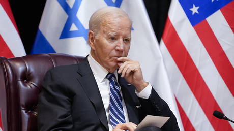 Joe Biden listens during a meeting with Israeli Prime Minister Benjamin Netanyahu in Tel Aviv, Israel, October 18, 2023