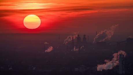 FILE PHOTO: Steam and exhaust rise from different companies on a cold winter day on January 6, 2017 in Oberhausen, Germany.