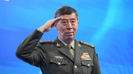 FILE PHOTO: Then-Chinese Defense Minister Li Shangfu salutes before delivering a speech at an event in Singapore, June 4, 2023.