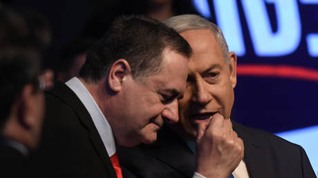 Israeli Prime Minister Benjamin Netanyahu speaks with Minister of Foreign Affairs Yisrael Katz, at a Likud party rally in Ramat Gan, ahead of the upcoming election on February 29, 2020, in Ramat Gan, Tel Aviv, Israel