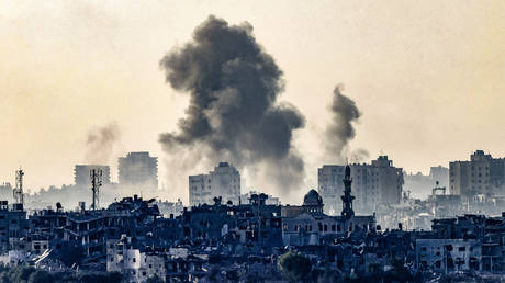 Smoke ascending over the northern Gaza Strip following an Israeli strike, amid the ongoing battles between Israel and the Palestinian group Hamas.