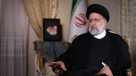 A handout picture provided by Iran's Presidency on October 28, 2023, shows Iranian President Ebrahim Raisi during an interview with the Qatari news television network Al-Jazeera in Tehran.