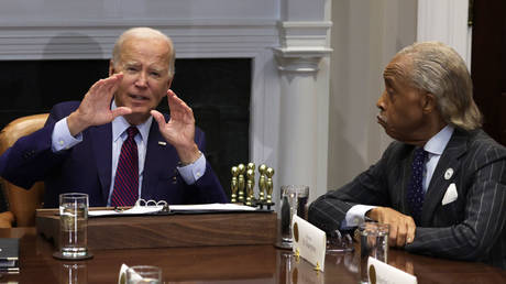  US President Joe Biden speaks with the Rev. Al Sharpton and other civil rights leaders at the White House in August.