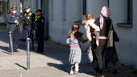 File photo: Police guard the Kahal Adass Jisroel synagogue in Berlin, Germany, October 18, 2023.