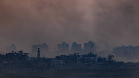 Smoke rises from explosions during rocket strikes in Gaza on October 28, 2023 as seen from Sderot, Israel.