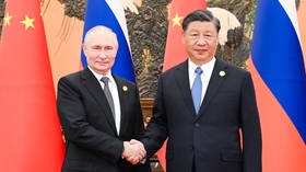 Xi pledges new Russia-China economic corridor