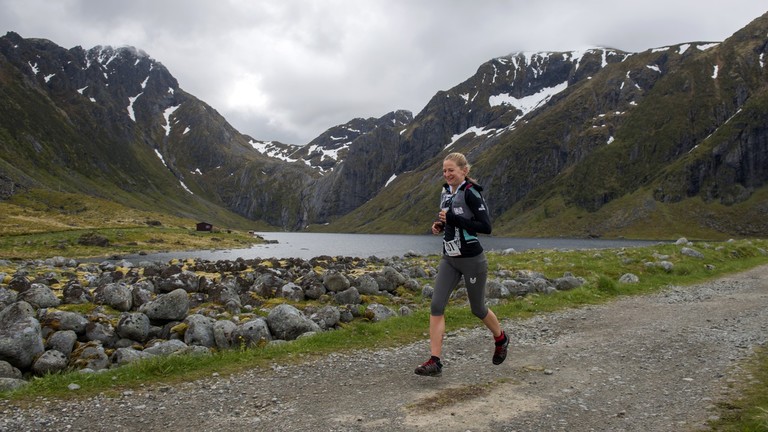 Runner banned for using car during race