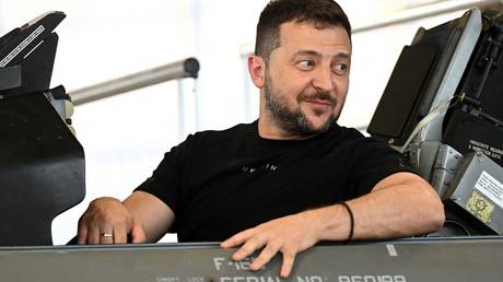 FILE PHOTO: Ukrainian President Vladimir Zelensky sits in an F-16 fighter jet in Vojens, Denmark.