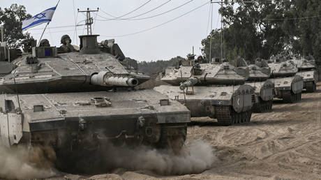 Israeli army Merkava battle tanks on the border with the Gaza Strip.