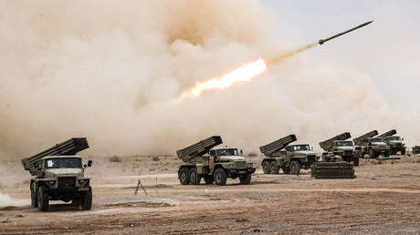 A handout picture provided by the Iranian Army media office on October 28, 2023 shows missiles being launched during a military drill in the Isfahan province in central Iran.