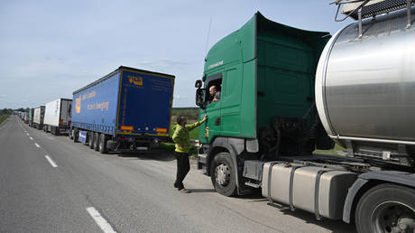 FILE PHOTO: Trucks queue on over ten kilometers at the Rava-Ruska border checkpoint on the Ukrainian-Polish border, on April 18, 2023.