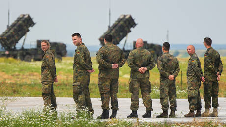 German troops supervise the deployment of Patriot missile defense systems in Zamosc, Poland