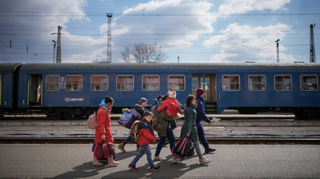 FILE PHOTO: Refugees fleeing Ukraine arrive at the border train station of Zahony, Hungary.
