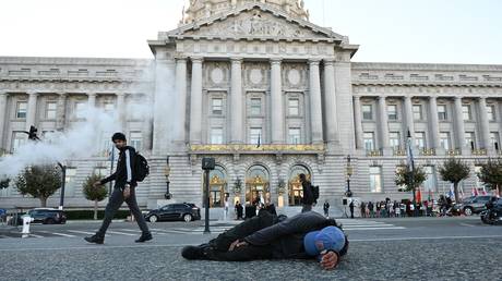  A homeless man outside the San Francisco City Hall.