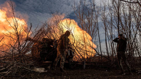 Ukrainian soldiers fire artillery earlier this month in the Donbass region.