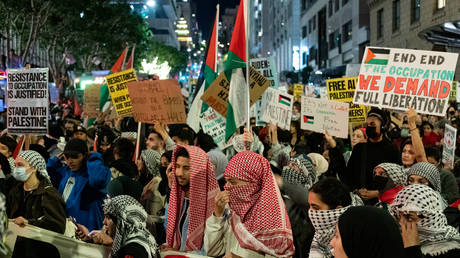 Protesters marching in support of Palestinians fill an intersetion near where the US President was holding a fundraiser while in town for the Asia-Pacific Economic Cooperation (APEC) summit in San Francisco, on November 14, 2023.