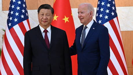 FILE PHOTO. US President Joe Biden (R) and China's President Xi Jinping (L) meet on the sidelines of the G20 Summit in Nusa Dua on the Indonesian resort island of Bali on November 14, 2022.