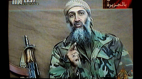 FILE PHOTO: A video released in December 2001 shows Osama bin Laden describing the World Trade Center attack as "commendable."