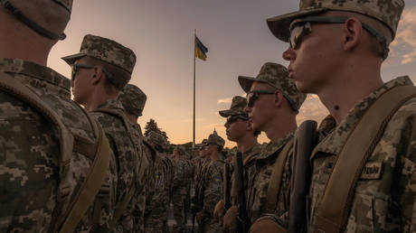 Ukrainian cadets attend a ceremony for taking the military oath at The National Museum of the History of Ukraine in the Second World War, in Kiev, on September 8, 2023.