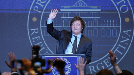Javier Milei waves during his victory speech after winning the presidential runoff election in Buenos Aires, Argentina, November 19, 2023