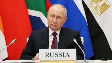 Russian President Vladimir Putin takes part, via videoconference, in an extraordinary BRICS summit to discuss the Palestinian-Israeli conflict, at the Kremlin in Moscow, Russia.