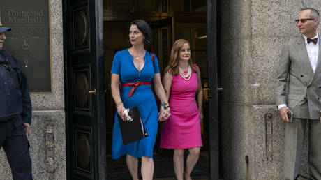 Elizabeth Stein (L) leaves the courtroom with fellow Epstein accuser Sarah Ransome after Ghislaine Maxwell's sentencing