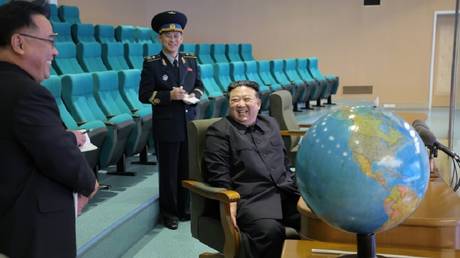North Korean leader hails ‘new era of space power’ — RT World News