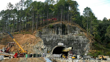 Rescue personnel work at the collapsed under construction Silkyara tunnel in the Uttarkashi district of India's Uttarakhand state, on November 25, 2023.