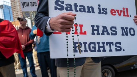 Members of a Christian activist group hold a demonstration outside of a Boston hotel where the Satanic Temple is holding SatanCon, which they claim as the largest satanic gathering in history on April 28, 2023 in Boston, Massachusetts.