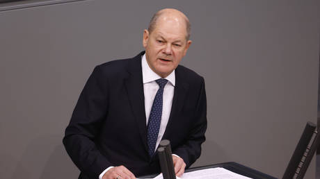 German Chancellor Olaf Scholz speaks in the plenary hall of the German parliament in Berlin on November 28, 2023
