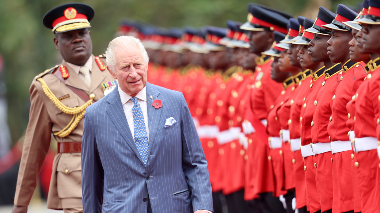 King Charles III walks past a guard of honour during the Ceremonial Welcome at State House on October 31, 2023 in Nairobi, Kenya.