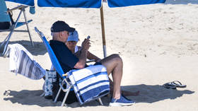 Ally teases Biden with beach invitation