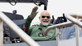 Modi flies India-made combat aircraft (VIDEO)