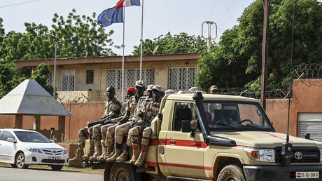 FILE PHOTO: A patrol of the Niger National Police drives past the French Embassy in Niamey, Niger on August 28, 2023.