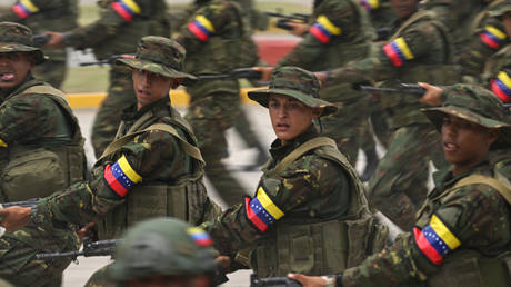 FILE PHOTO: Soldiers of the Venezuelan Army march during a rehearsal parade.